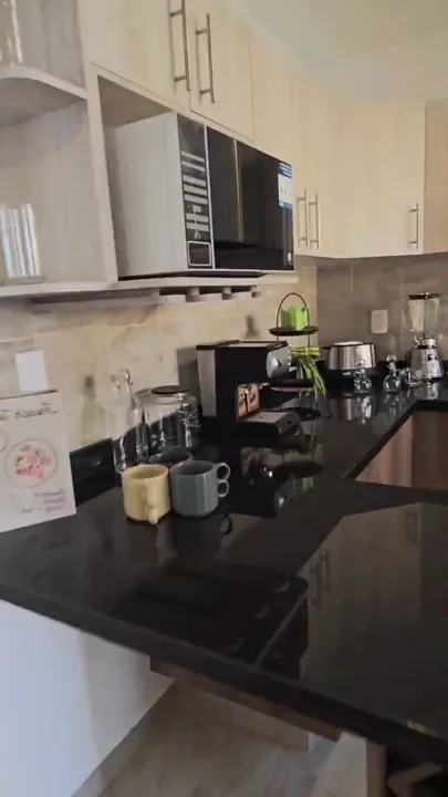 Cocina de la casa muestra en Residencial Los Sauces Sur