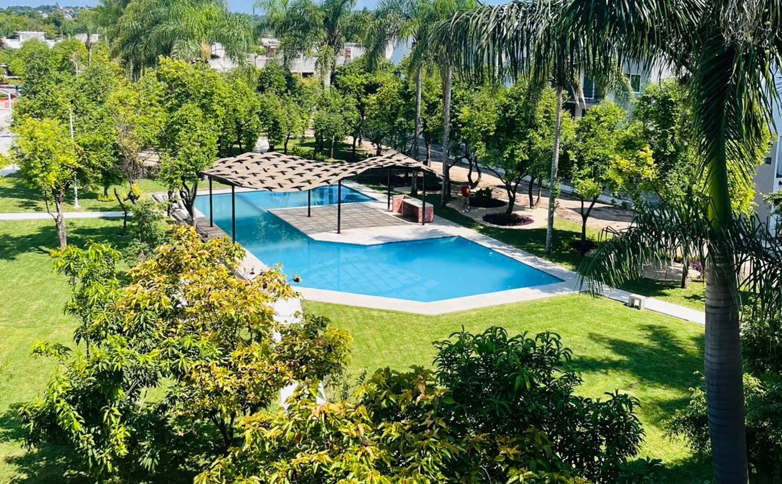 Alberca y áreas verdes de Residencial Paraíso Yautepec